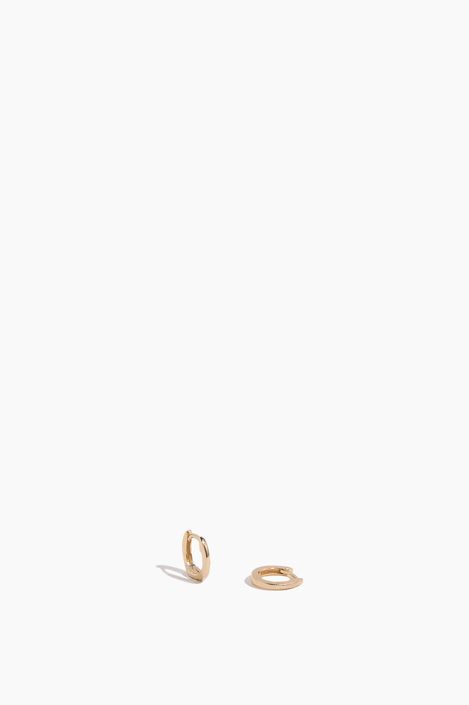 DRD Solid Gold Mini Huggies in 14k Yellow Gold