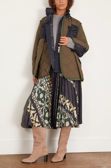 Sacai Coats Rip Stop Quilted Coat in Khaki/Dark Navy Sacai Rip Stop Quilted Coat in Khaki/Dark Navy