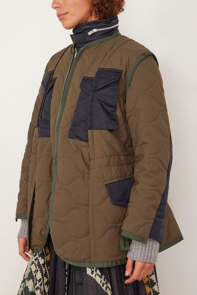 Sacai Coats Rip Stop Quilted Coat in Khaki/Dark Navy Sacai Rip Stop Quilted Coat in Khaki/Dark Navy